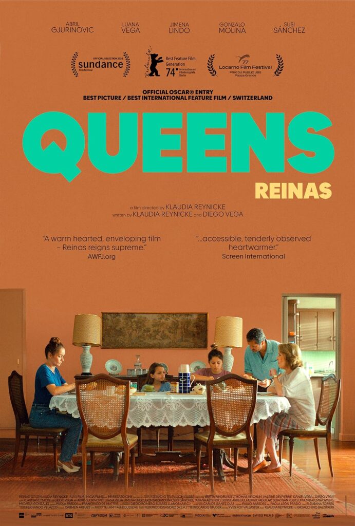 A poster of a family sitting at a dining table, with the title, QUEENS in large font above them.